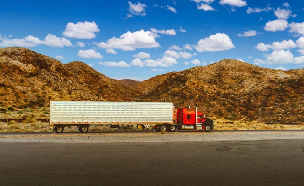 Refrigerated trailer truck on a desert highway